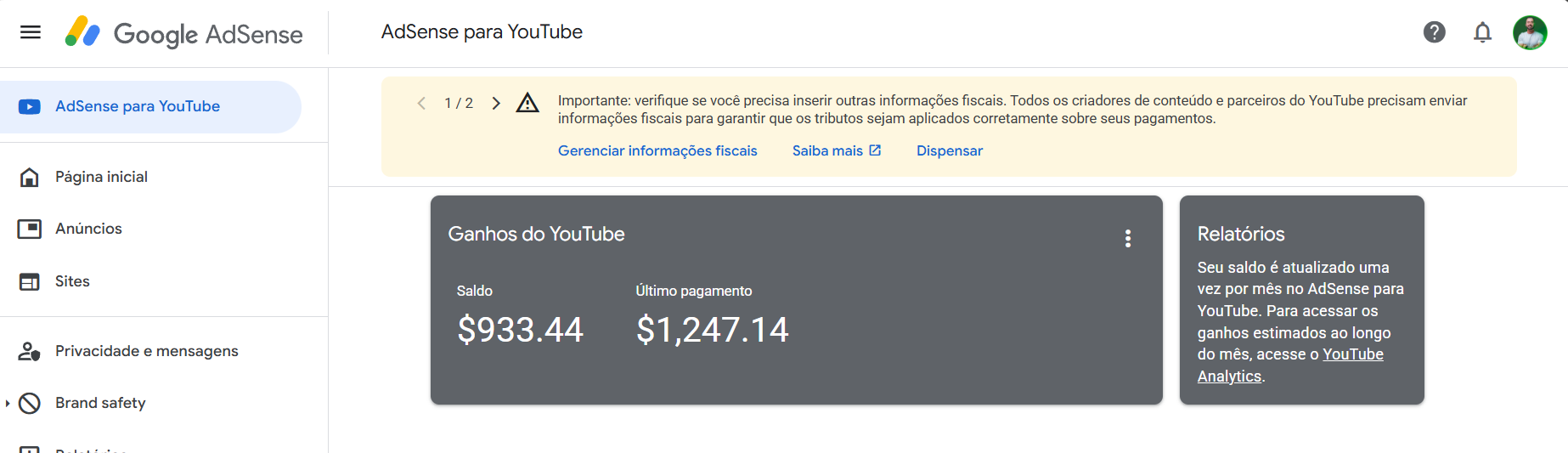 Painel Google AdSense para YouTube — último pagamento de $1.247,14 e saldo de $933,44