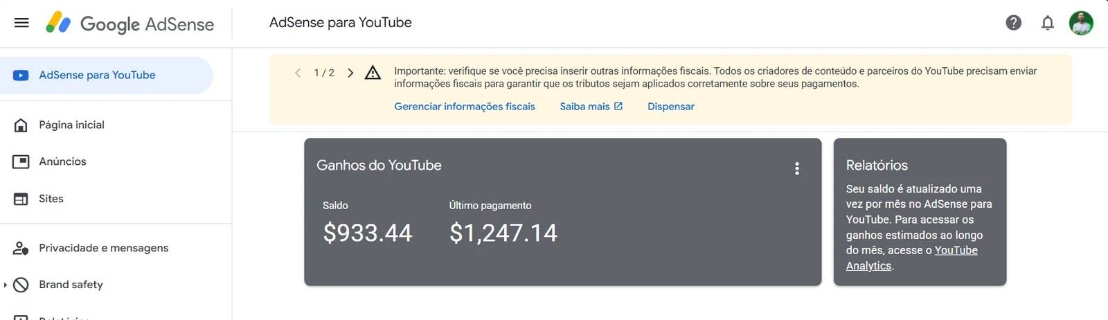 Painel Google AdSense para YouTube — último pagamento de $1.247,14 e saldo de $933,44